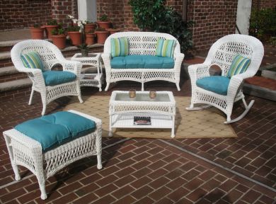 4 Piece Madrid Wicker Set with Seat Cushions (1) Love Seat (1) Coffee Table (2) Chairs