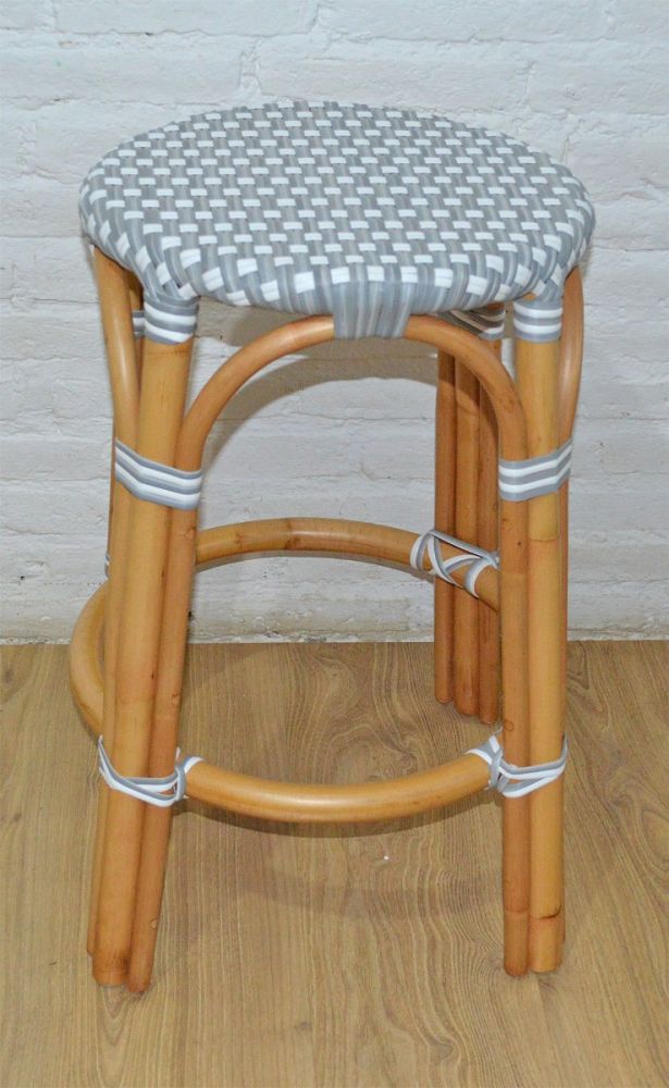 Blue and white wicker bar outlet stools